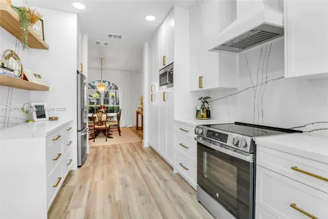 $1,100,000 | 10777 Charleston Place, Cooper City, FL 33026