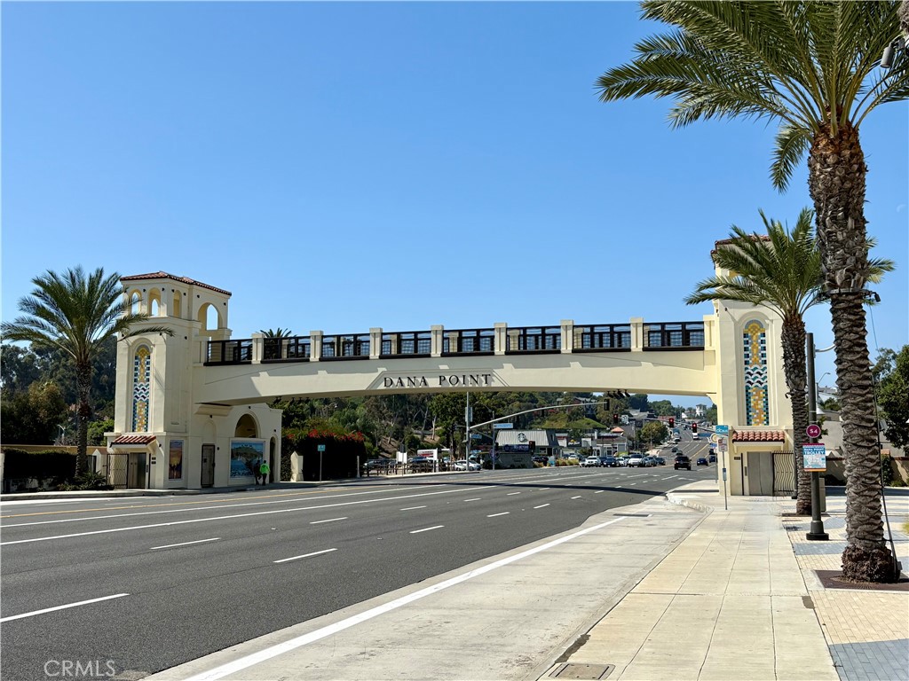 1632 Doheny Way Dana Point, CA 92629 - Photo 24 of 33 a view of a building and car parked on the road
