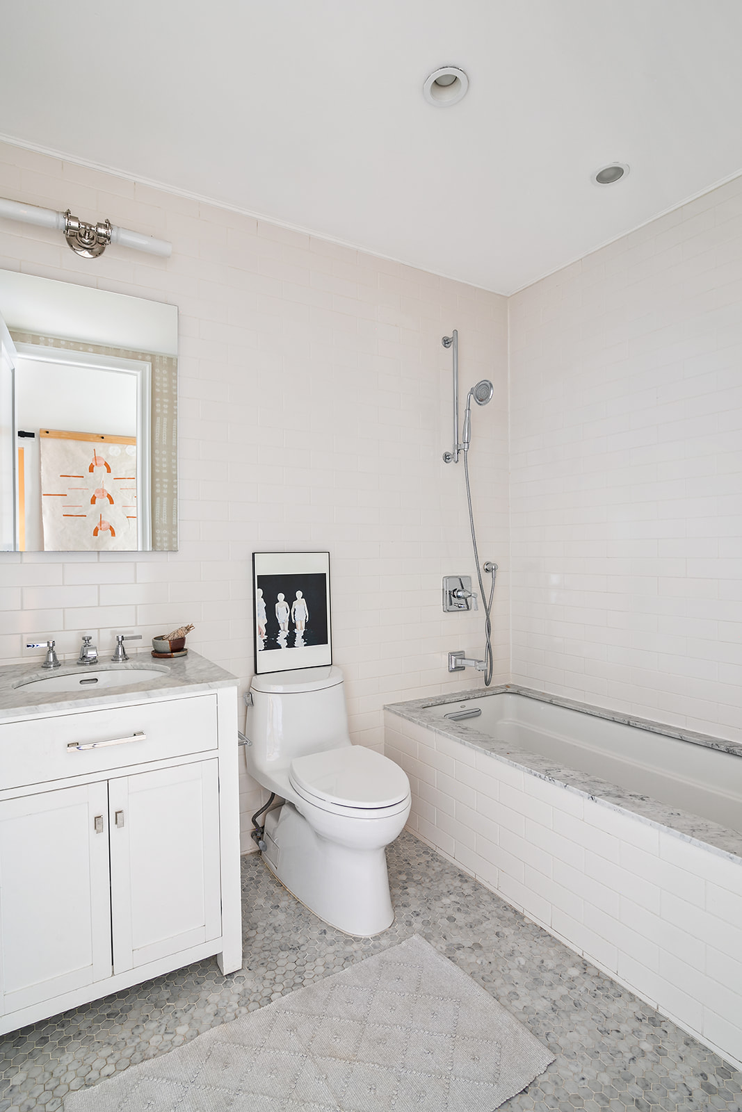 110 President Street, Unit 2 Brooklyn, NY 11231 - Photo 13 of 15 a bathroom with a toilet a sink a mirror and a bathtub