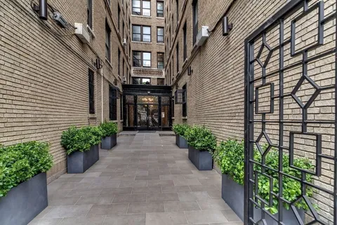 a view of a pathway with a house
