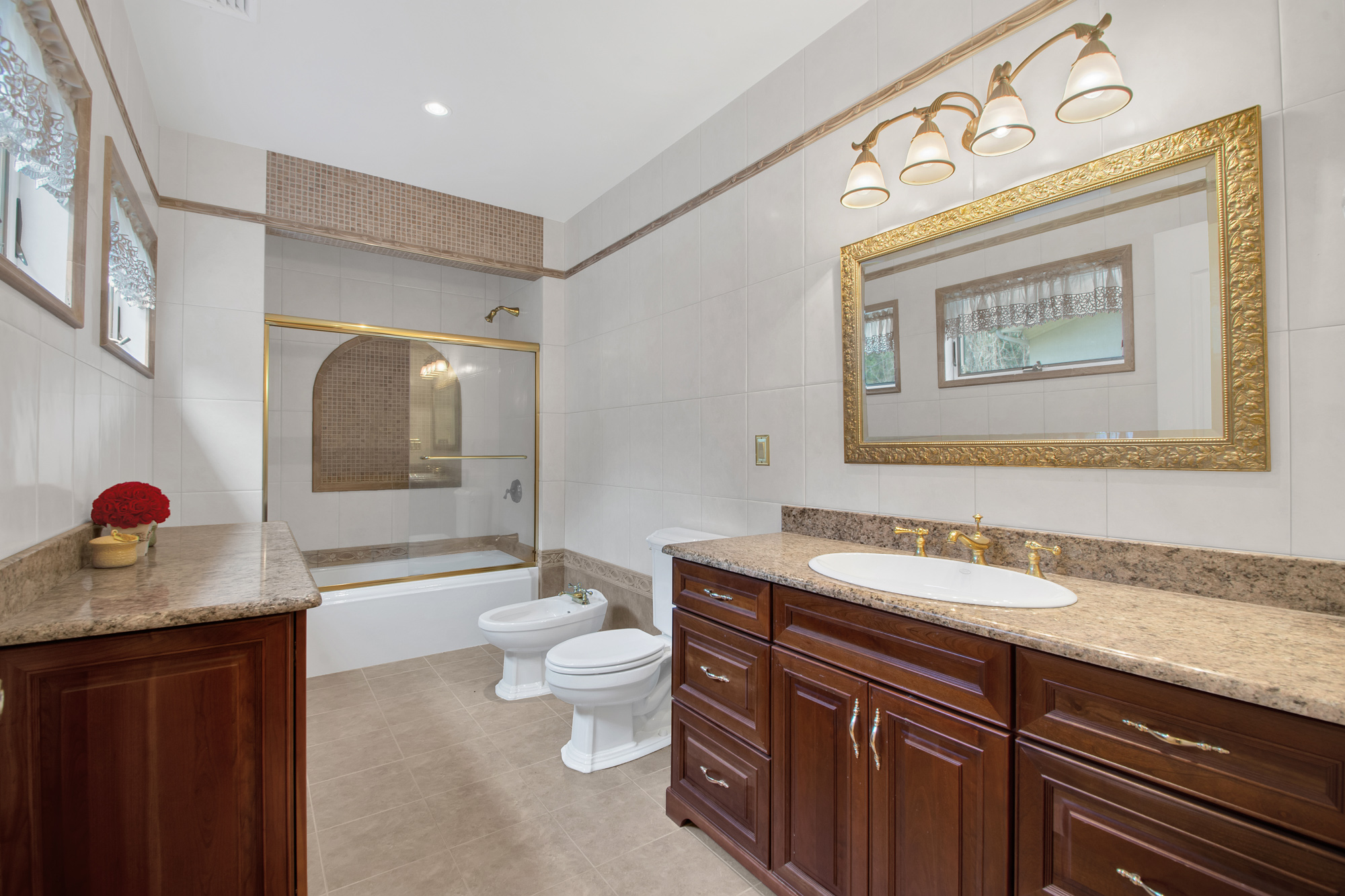 68 Circle Road Staten Island, NY 10304 - Photo 19 of 38 a bathroom with a granite countertop sink mirror vanity and toilet