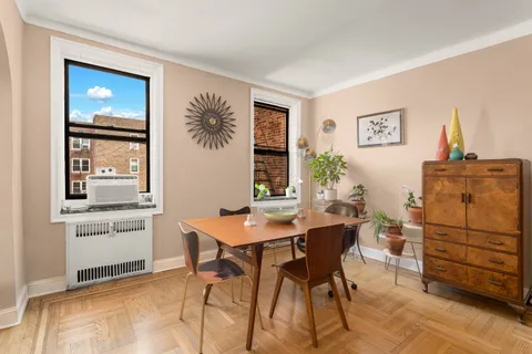 a workspace with furniture and window