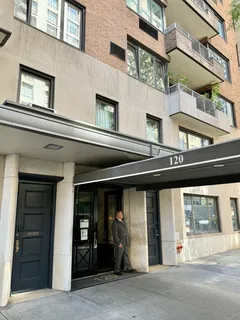 a front view of a building with glass windows