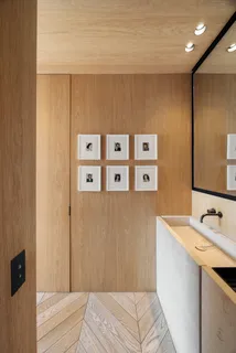 a bedroom with a bed and a sink