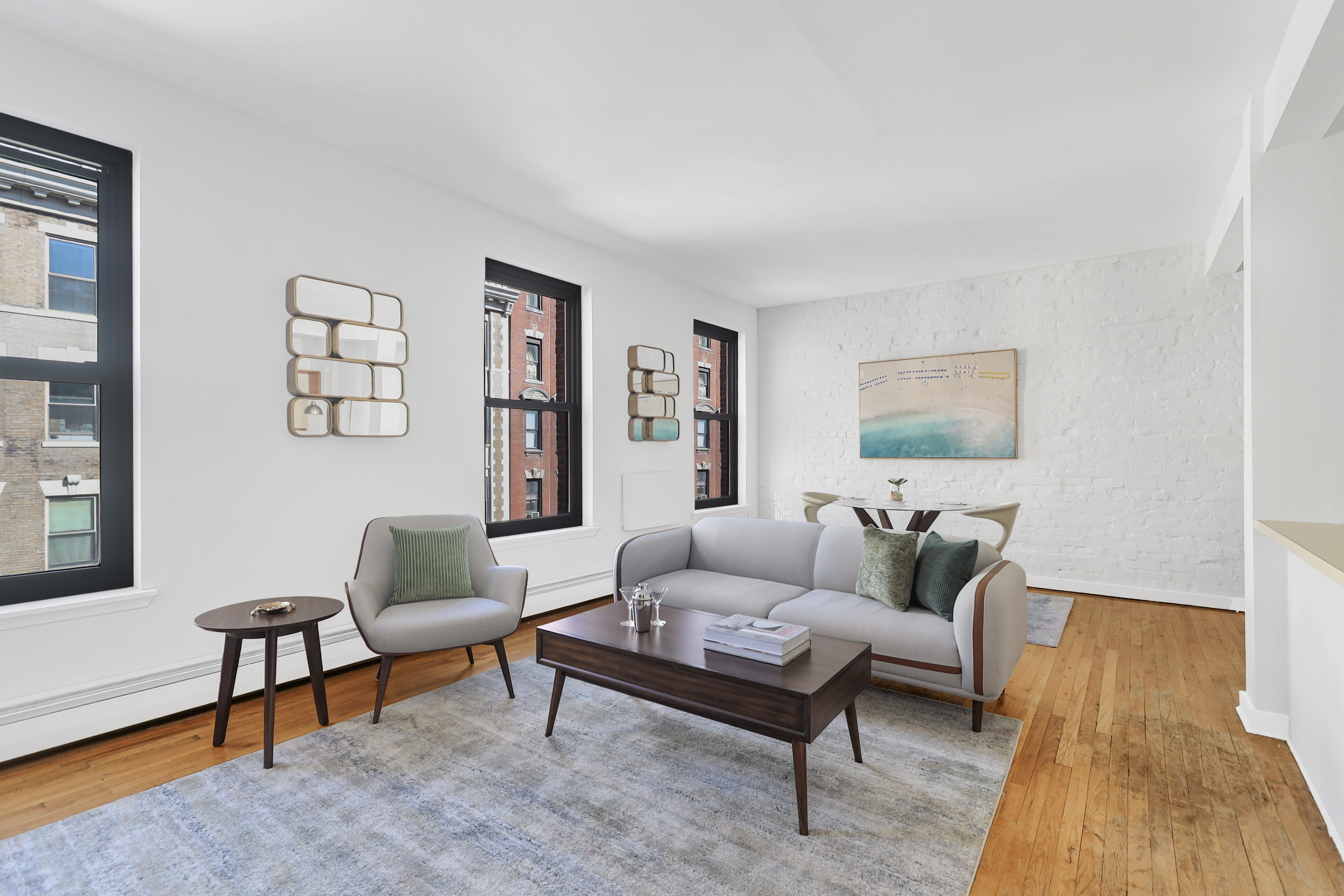 314 West 94th Street, Unit 5D Manhattan, NY 10025 - Photo 4 of 13 a living room with furniture and a rug
