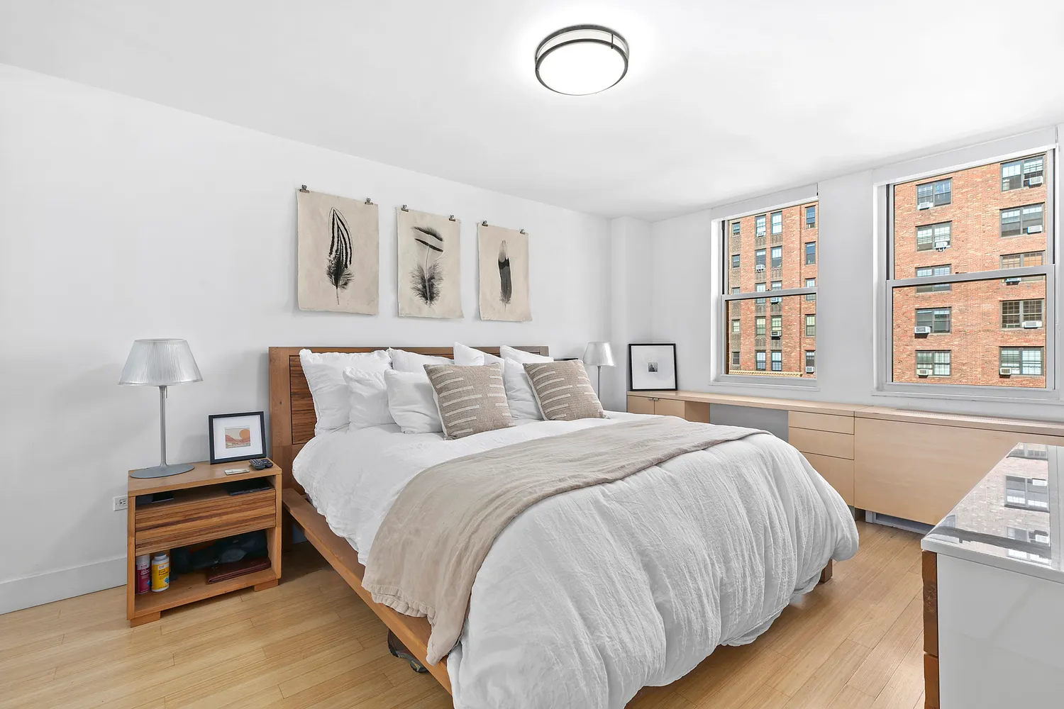 a bedroom with bed and a window