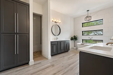 a house view with swimming pool and garden