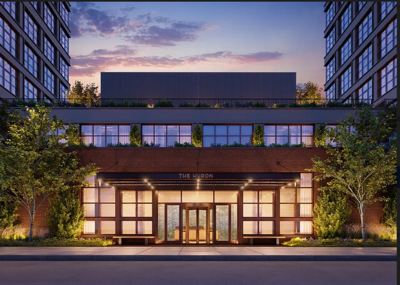 front view of a balcony with a lots of windows and plants