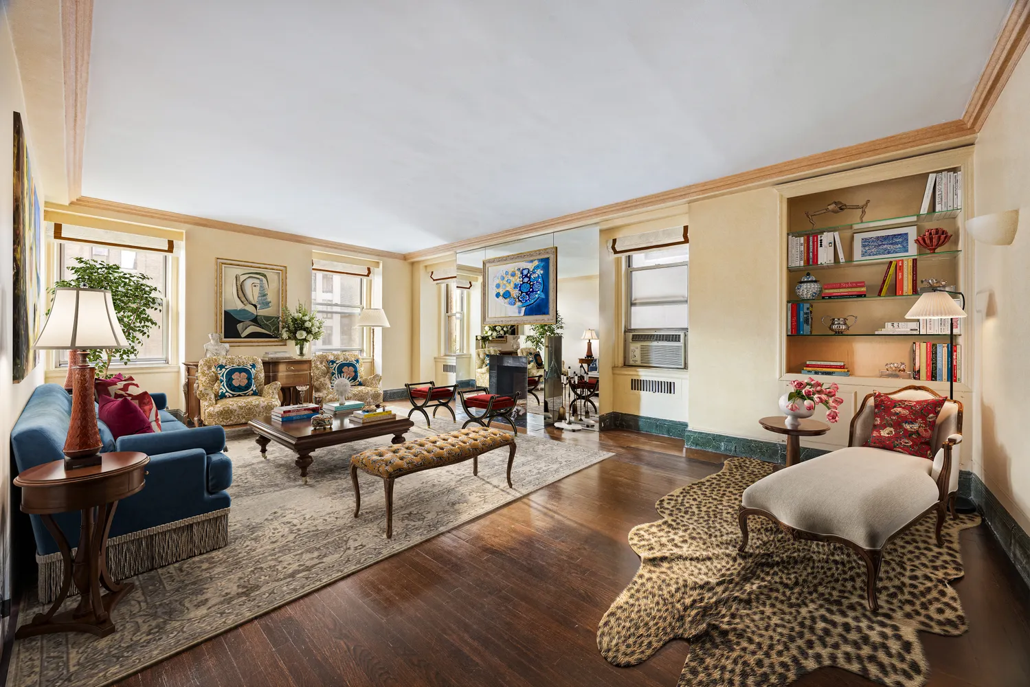 a living room with furniture fireplace and a window