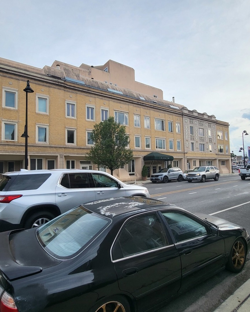 6337 Roosevelt Road, Unit 105 Berwyn, IL 60402 - Photo 2 of 21 a couple of cars parked in front of a house