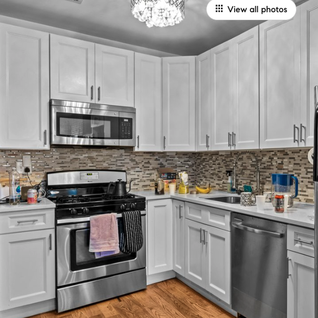 251 Troy Avenue Brooklyn, NY 11213 - Photo 3 of 9 a kitchen with cabinets appliances and a sink