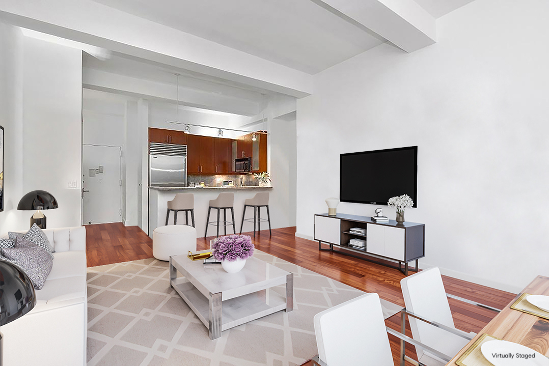 80 John Street, Unit 2F Manhattan, NY 10038 - Photo 2 of 7 a living room with furniture and a flat screen tv