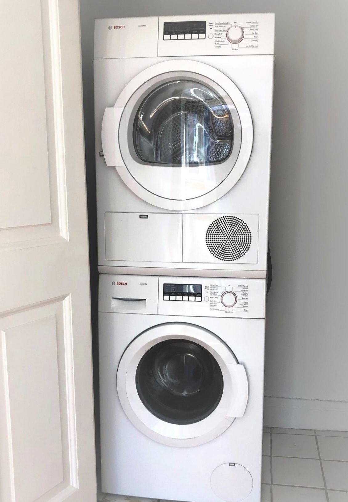 404 East 76th Street, Unit 4M Manhattan, NY 10021 - Photo 7 of 13 a utility room with dryer and washer
