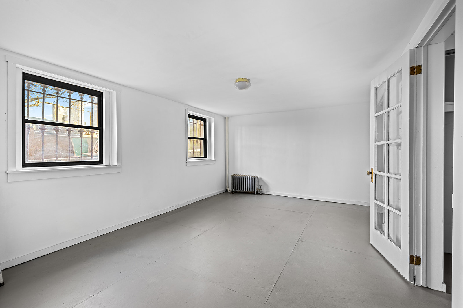 44 Butler Street Brooklyn, NY 11231 - Photo 9 of 22 a view of an empty room with a window