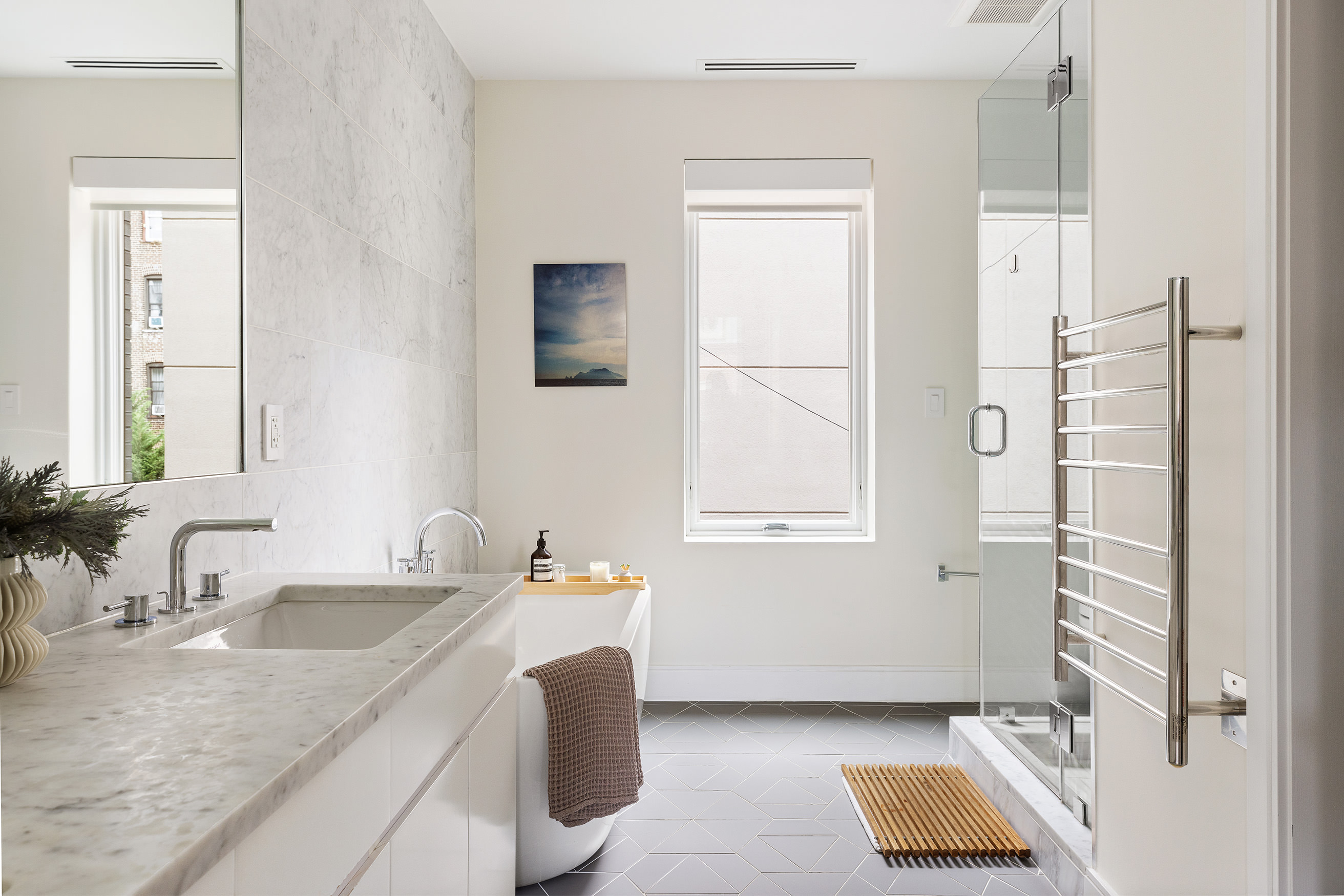 43 Dean Street Brooklyn, NY 11201 - Photo 8 of 17 a bathroom with a sink and a bathtub