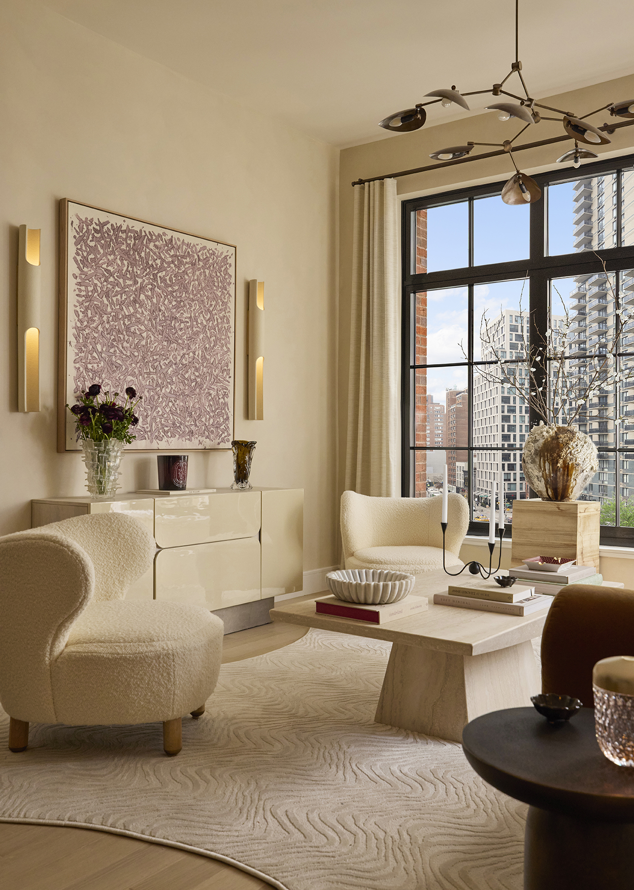 201 East 23rd Street, Unit 8A Manhattan, NY 10010 - Photo 3 of 25 a living room with furniture and a window