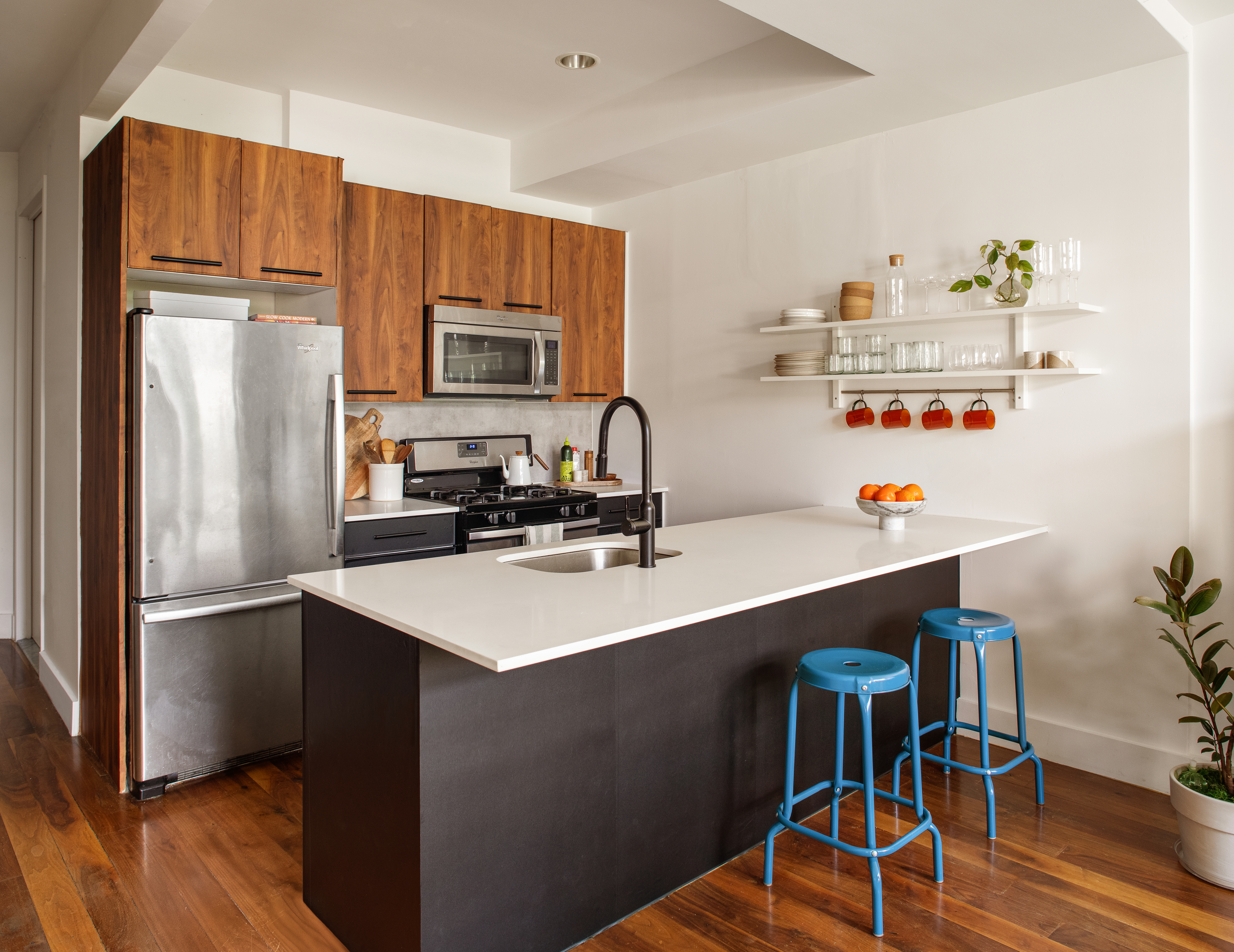 161 Jackson Street, Unit 1 Brooklyn, NY 11211 - Photo 4 of 11 a kitchen with stainless steel appliances a sink a refrigerator and a refrigerator