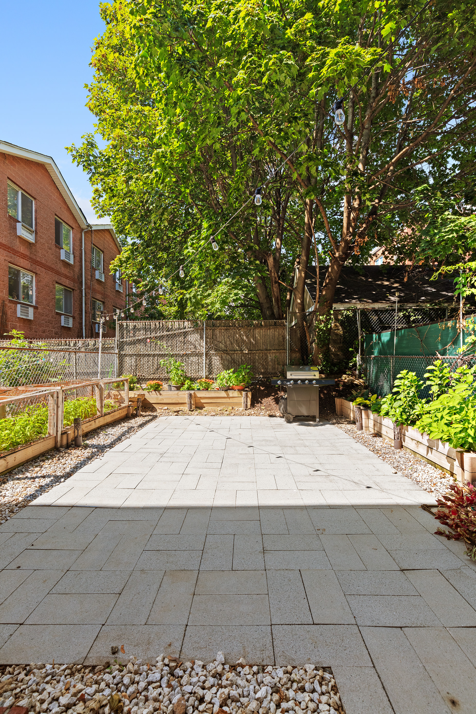 105-09 Otis Avenue, Unit 1B Queens, NY 11368 - Photo 6 of 9 a view of swimming pool with outdoor seating