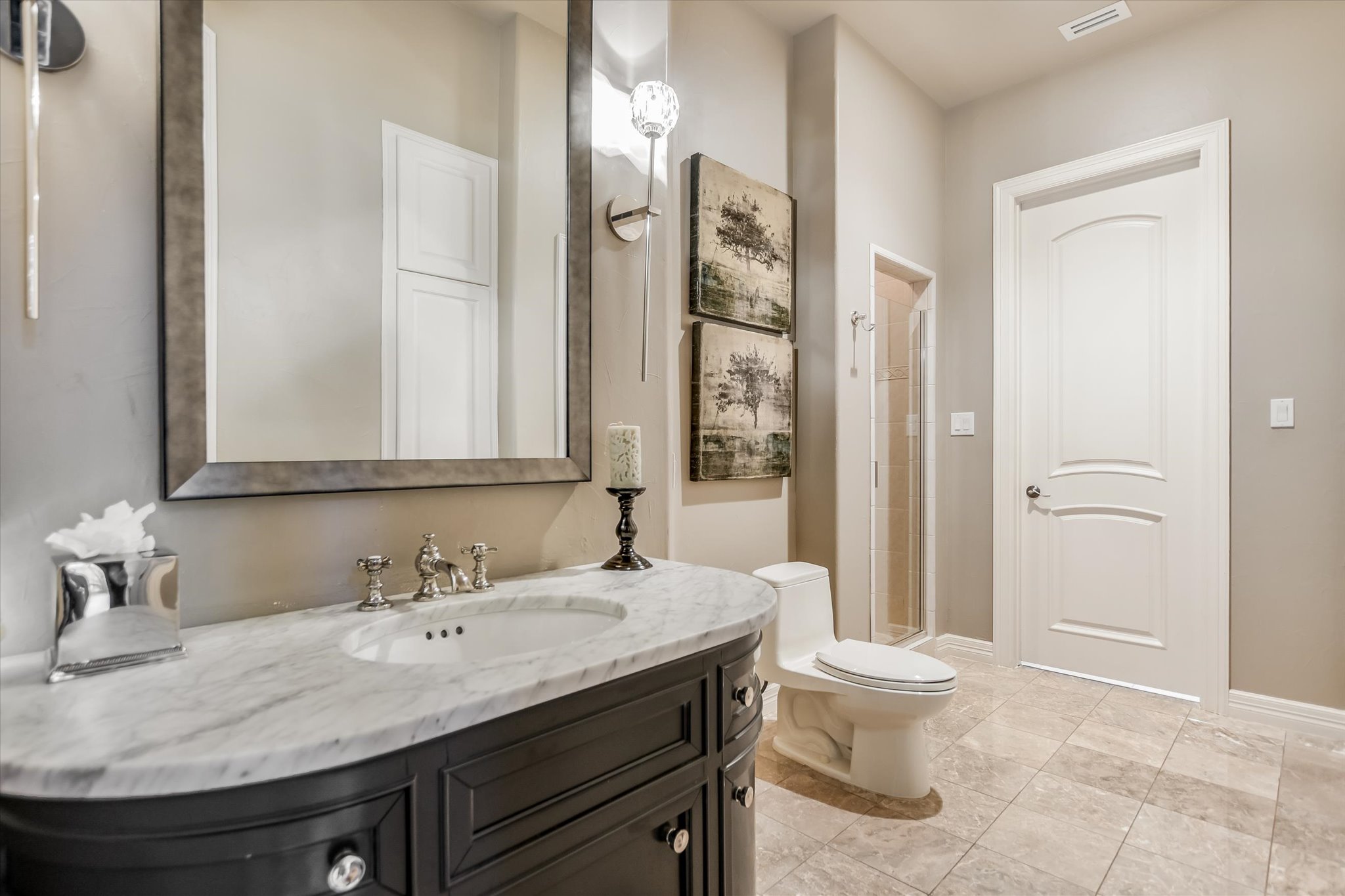 1422 Palomino Ridge Drive Austin, TX 78733 - Photo 32 of 60 a bathroom with a granite countertop sink toilet and shower