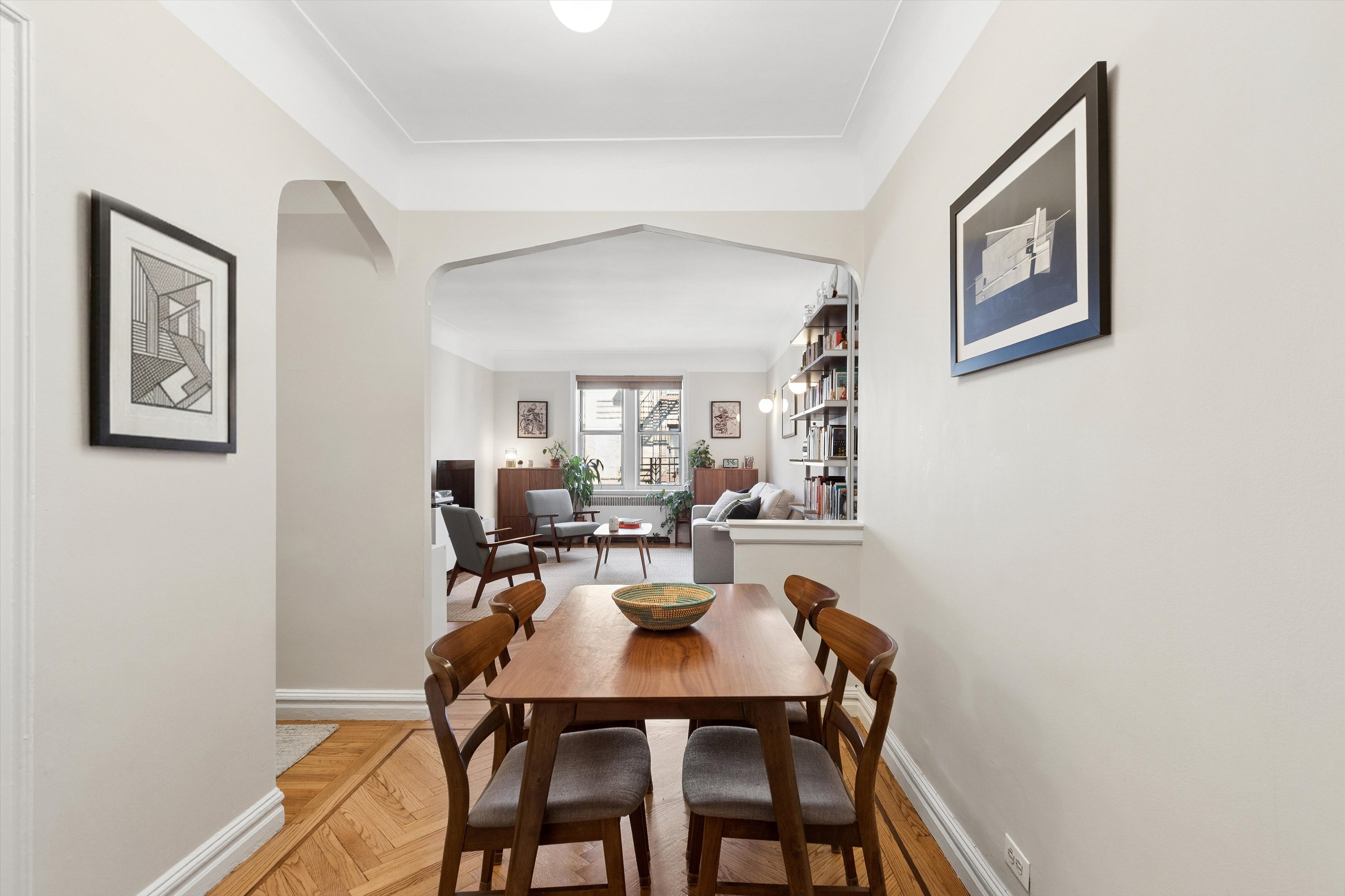 680 West 204th Street, Unit 5F Manhattan, NY 10034 - Photo 3 of 15 a view of a dining room with furniture and a potted plant