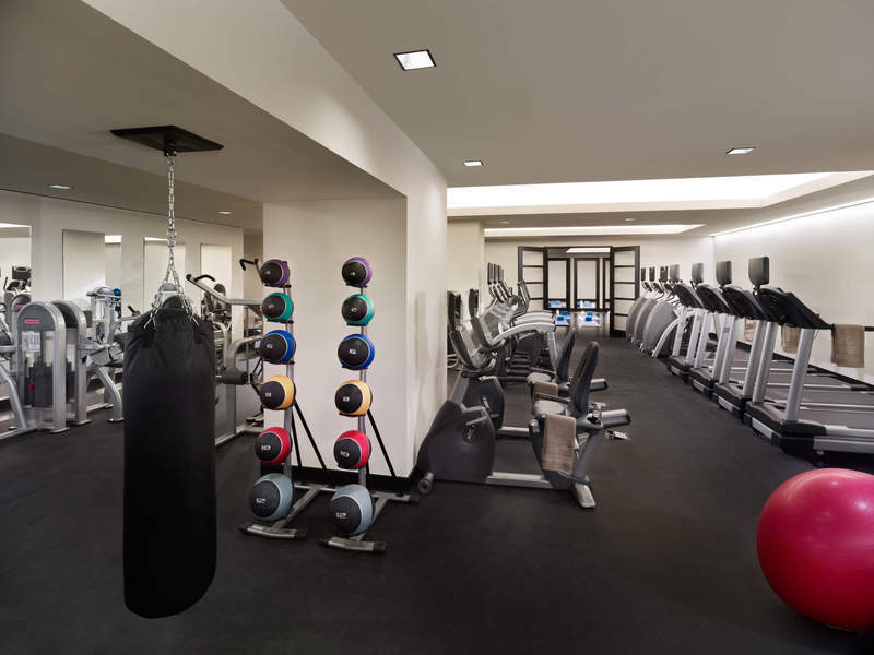 20 Pine Street, Unit 409 Manhattan, NY 10005 - Photo 8 of 11 a view of a room with gym equipment