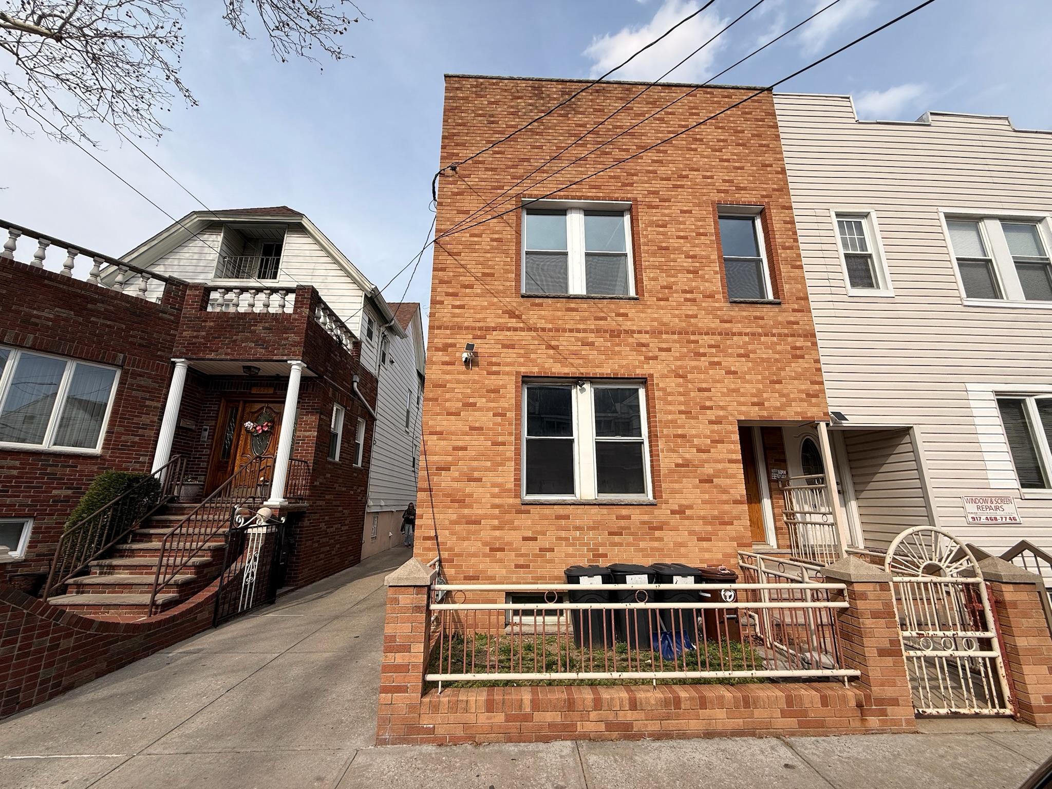 1675 85th Street, Unit 1R Brooklyn, NY 11214 - Photo 8 of 8 a front view of a house
