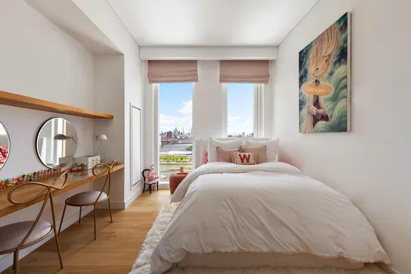 a bathroom with a tub sink and shower