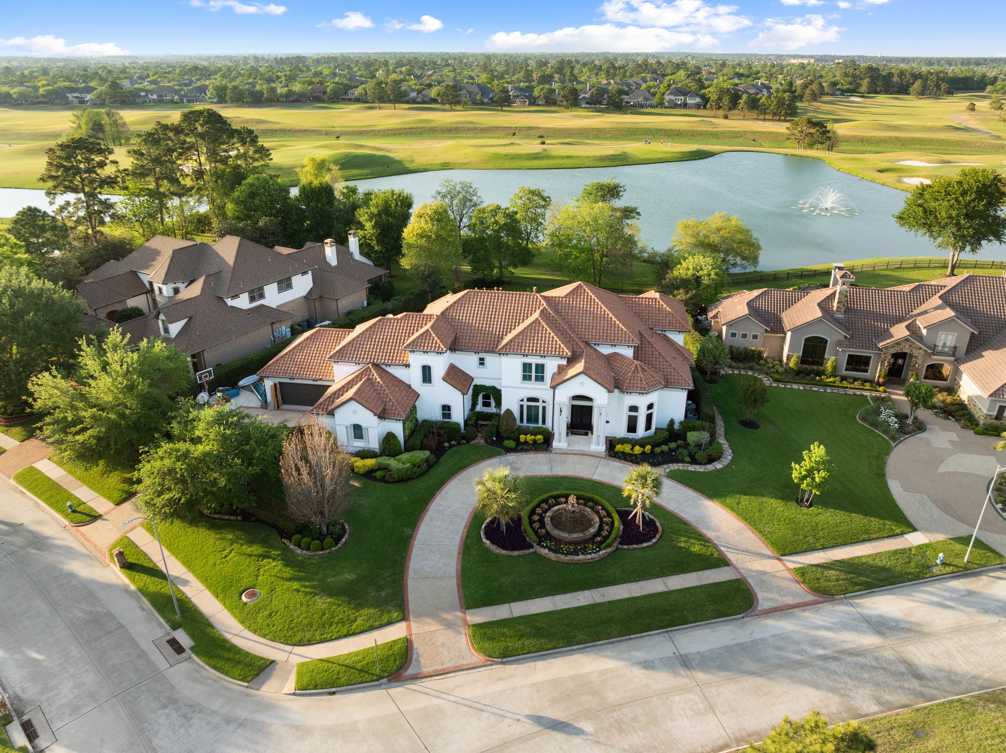 82 Manor Lake Estates Circle Spring, TX 77379 - Photo 3 of 52 an aerial view of a house with a ocean view