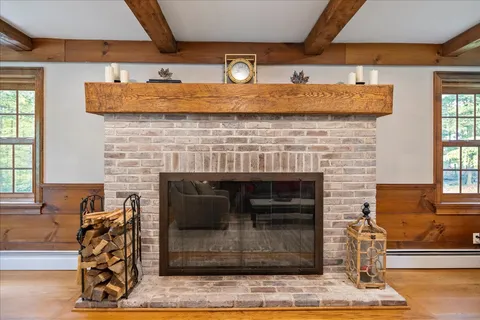 a kitchen with stainless steel appliances granite countertop a stove and a wooden cabinets