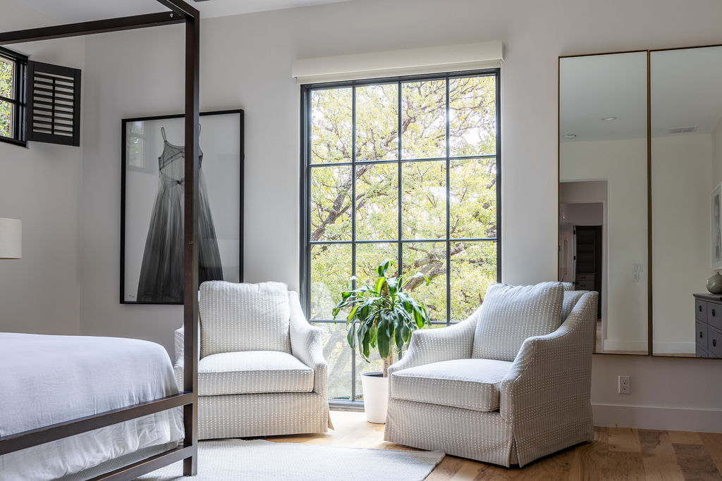 400 Inwood Road Austin, TX 78746 - Photo 24 of 43 a living room with furniture and a large window