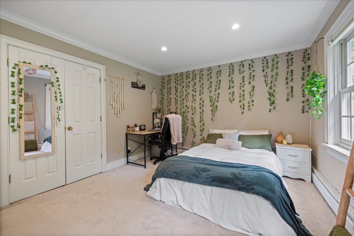 a kitchen with stainless steel appliances granite countertop a sink a stove and a wooden floors