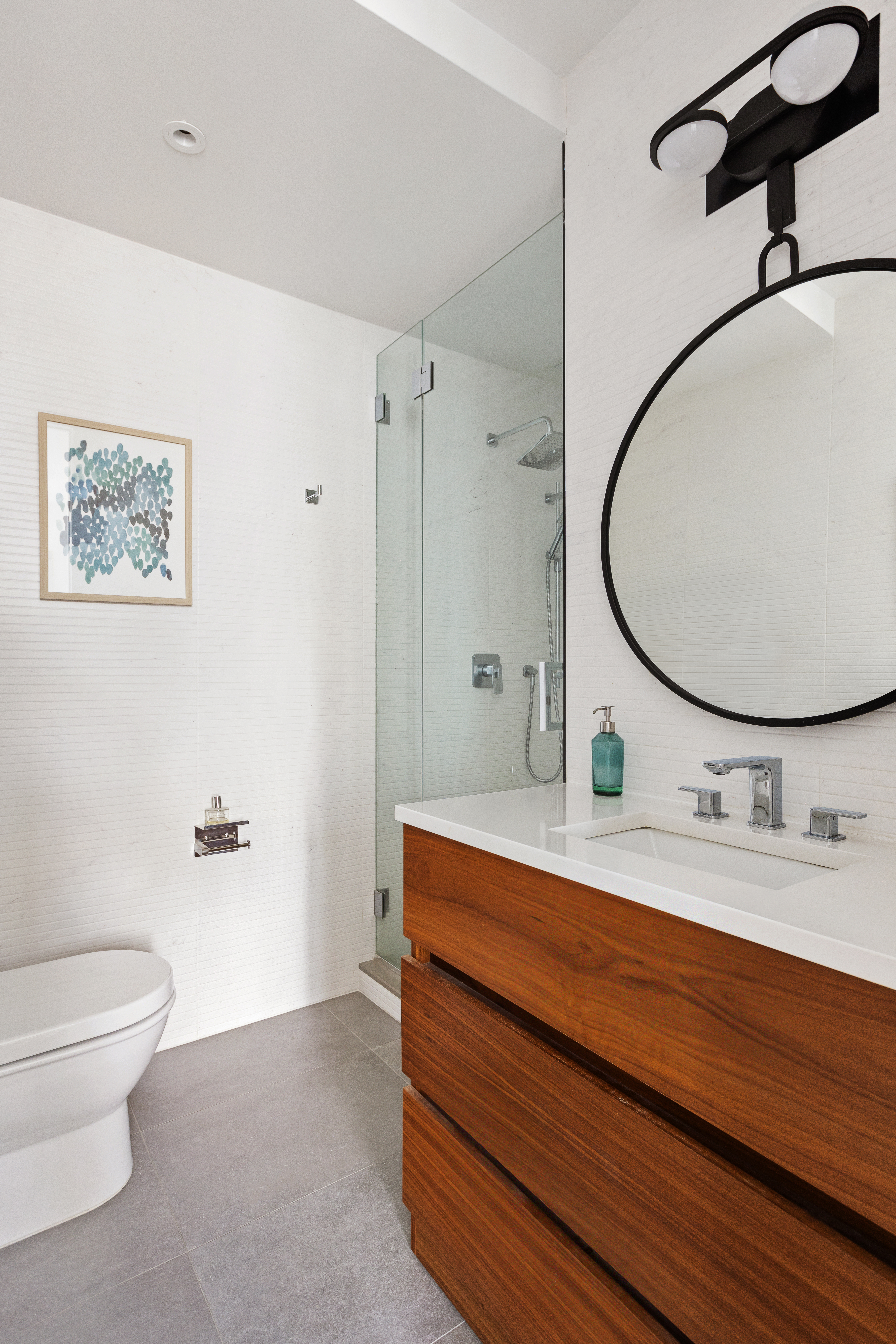112 Fleet Place, Unit 6A Brooklyn, NY 11201 - Photo 8 of 11 a bathroom with a sink and a mirror