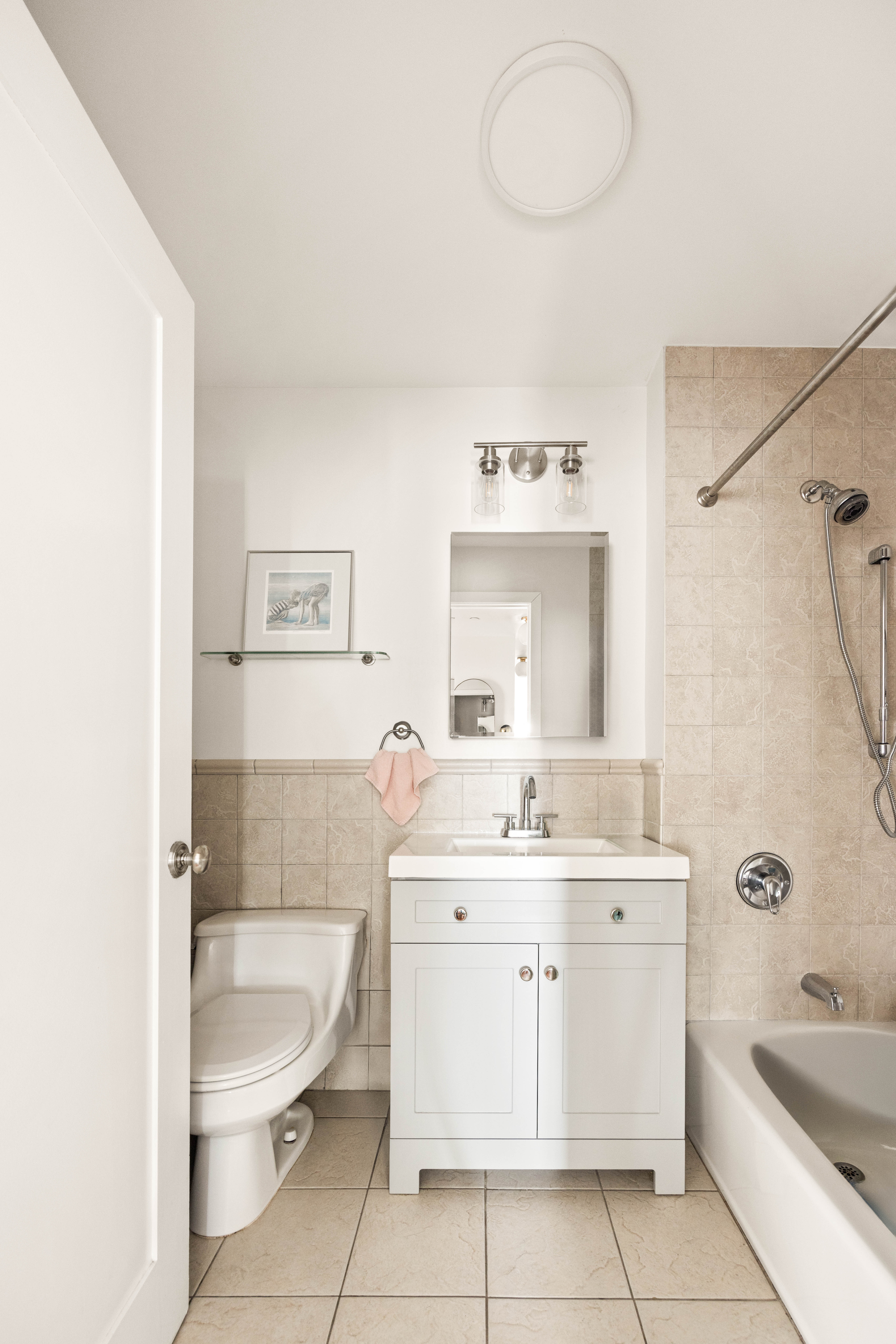 93 Rapelye Street, Unit 3D Brooklyn, NY 11231 - Photo 6 of 11 a bathroom with a sink a toilet and bathtub