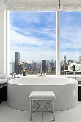 a living room with a table and chair