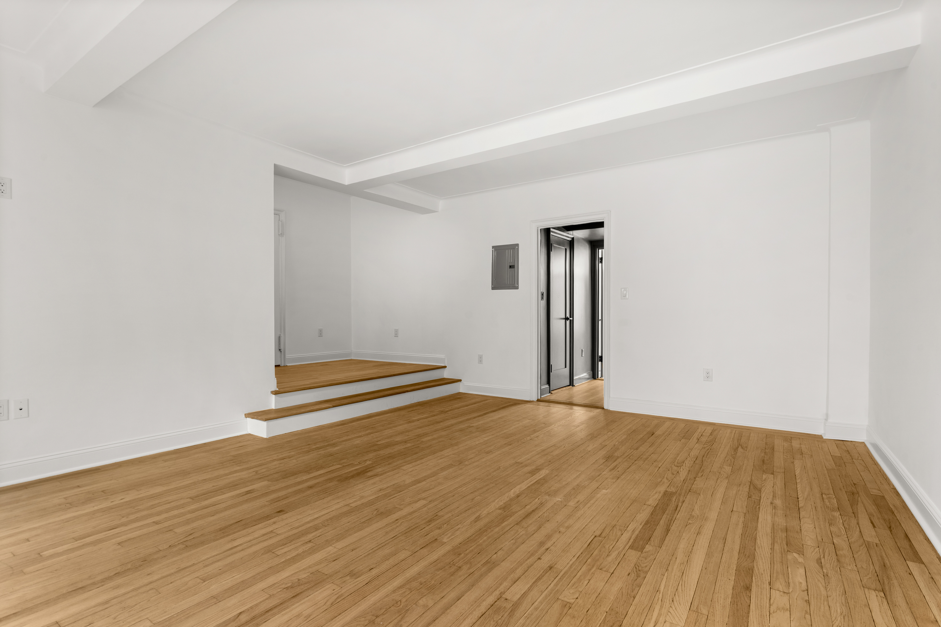 10 Park Avenue, Unit 6A Manhattan, NY 10016 - Photo 6 of 14 a view of empty room with wooden floor