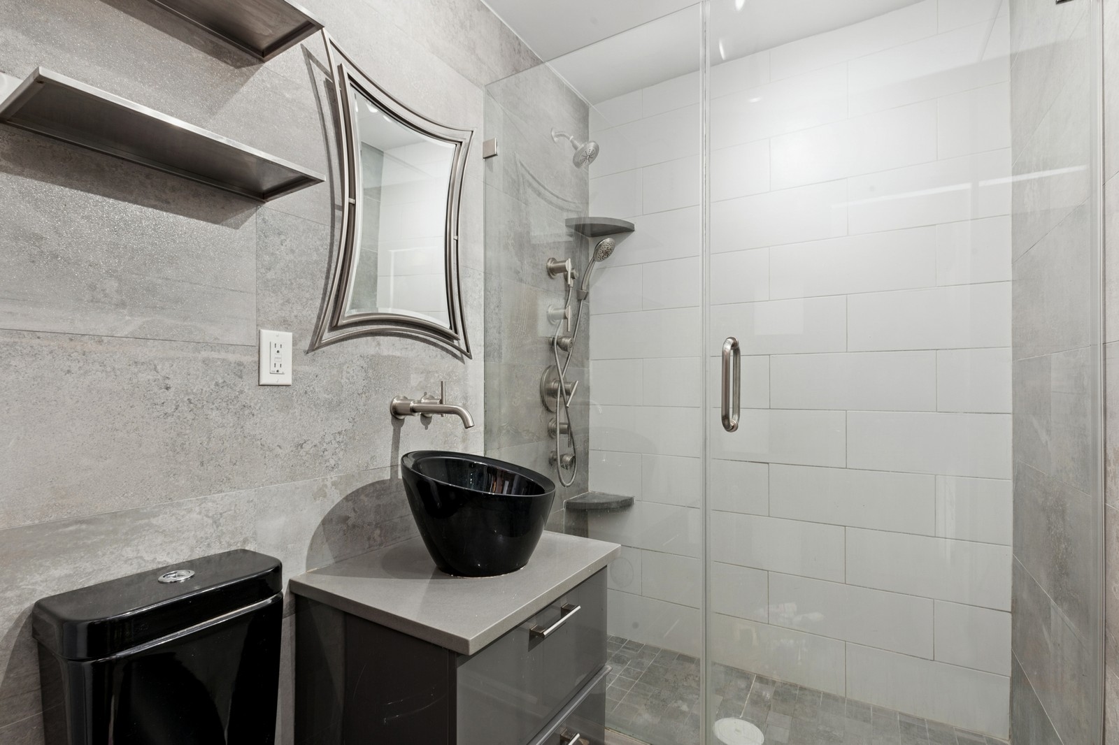 105 Ashland Place, Unit 10E Brooklyn, NY 11201 - Photo 5 of 7 a bathroom with a granite countertop sink a toilet and shower