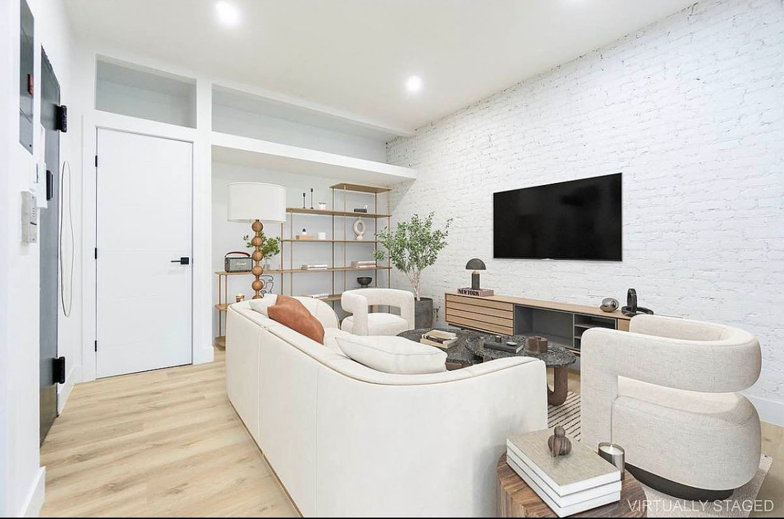 180 5th Avenue, Unit 3 Brooklyn, NY 11217 - Photo 4 of 13 a living room with furniture and a flat screen tv
