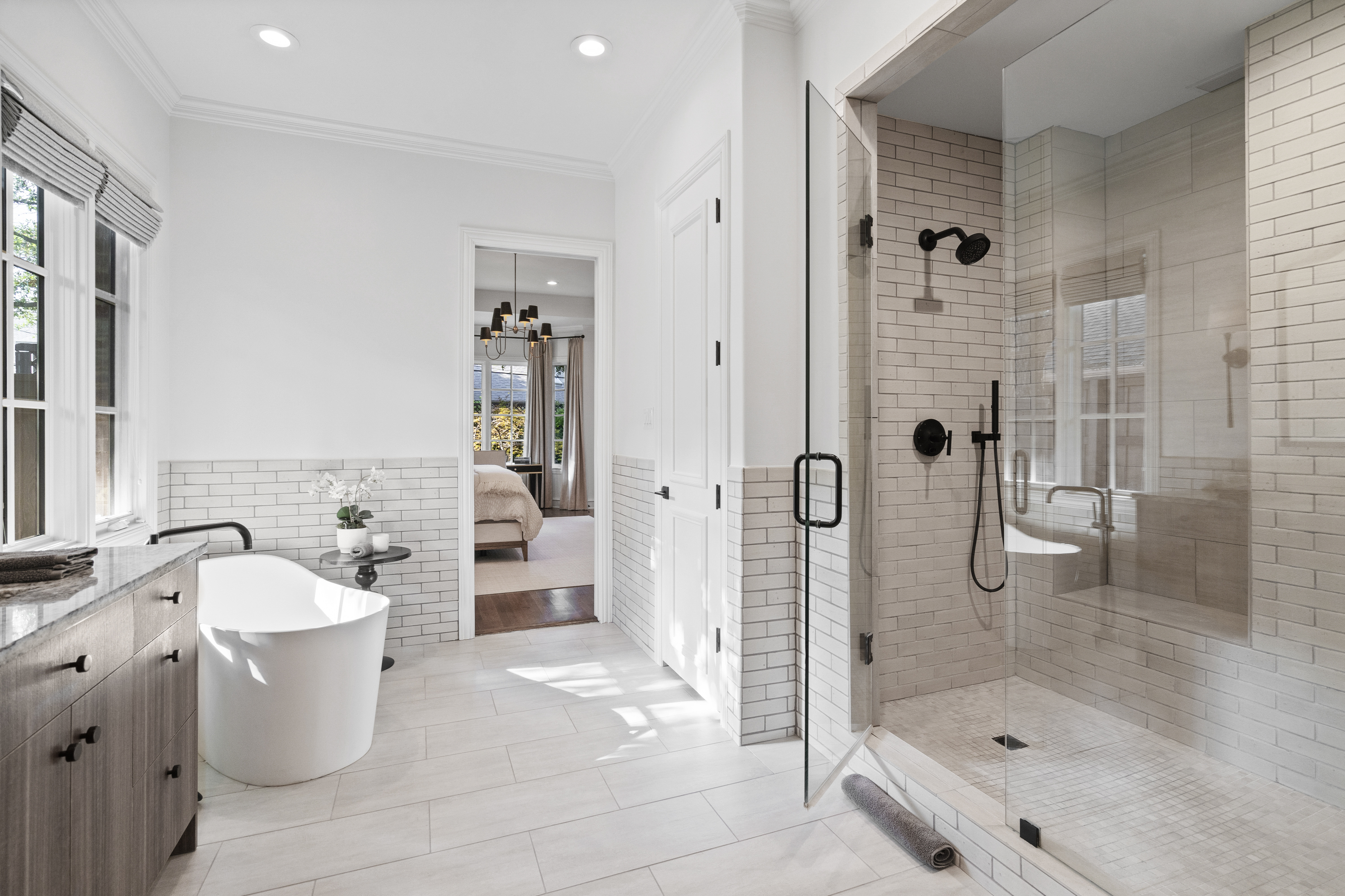 6607 Meadow Road Dallas, TX 75230 - Photo 20 of 32 a bathroom with a sink a toilet and shower