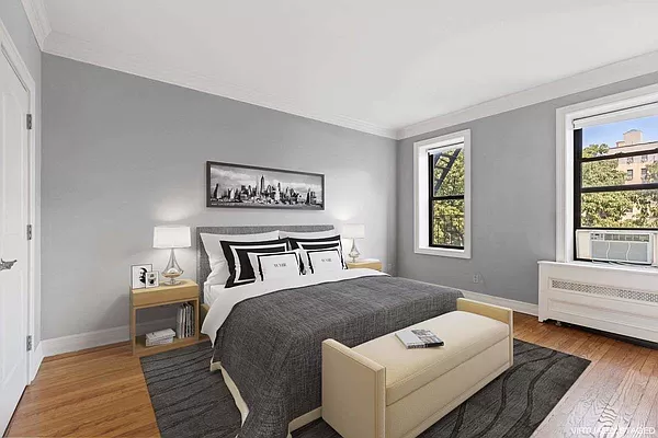 779 Riverside Drive, Unit C41 Manhattan, NY 10032 - Photo 2 of 5 a bedroom with a bed and a window