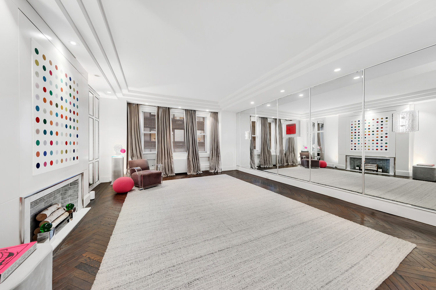 465 Park Avenue, Unit 9F Manhattan, NY 10022 - Photo 2 of 13 a bed room with a bed and a couch