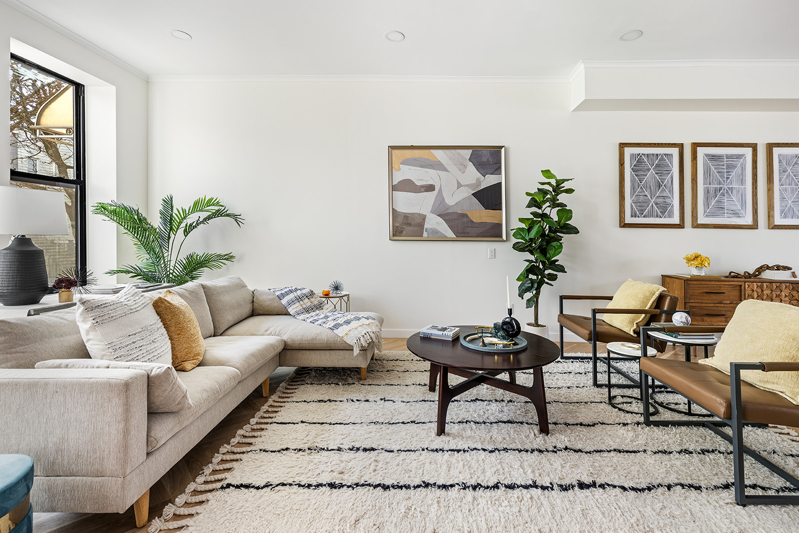 95 Moffat Street Brooklyn, NY 11207 - Photo 6 of 18 a living room with furniture and a potted plant