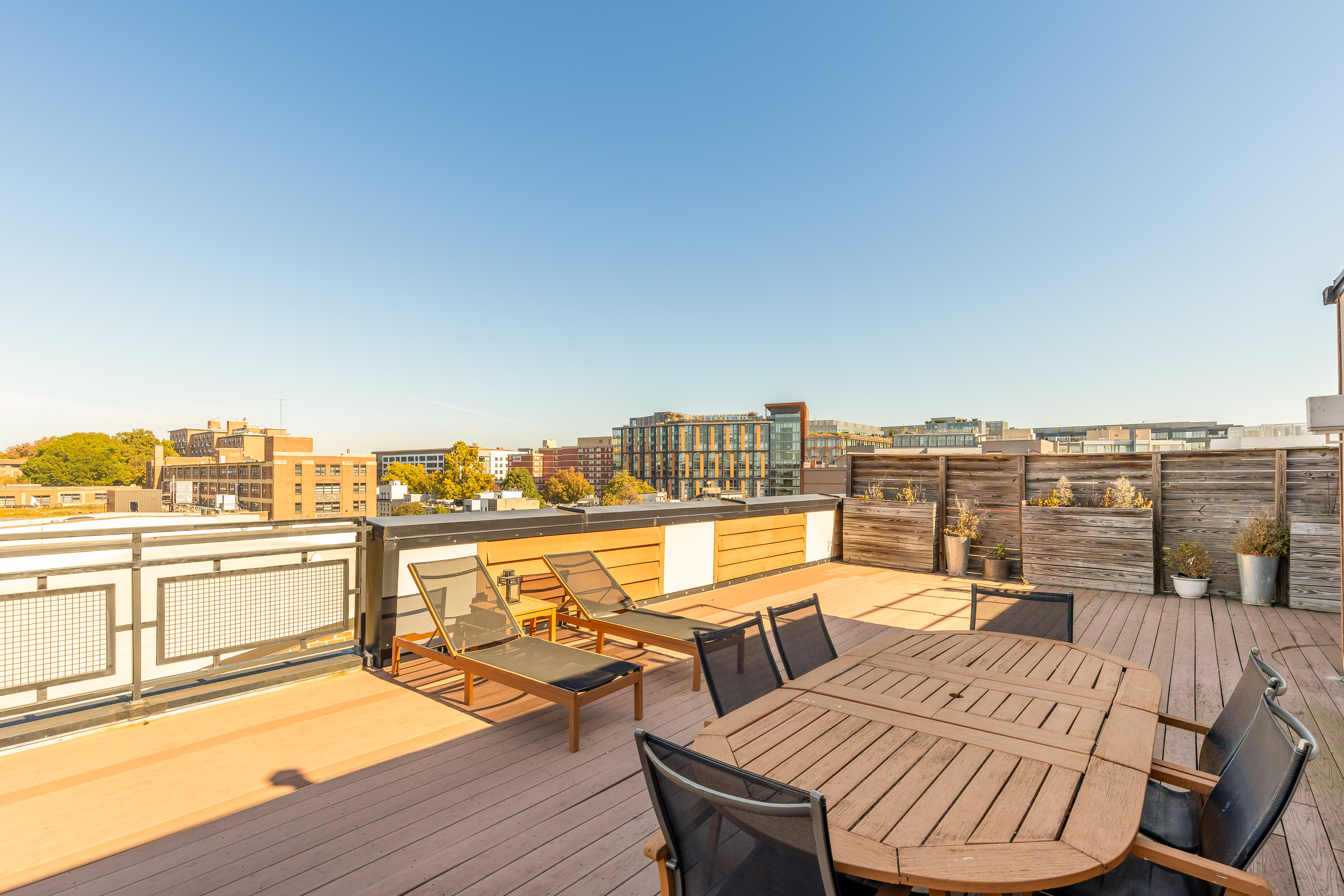 2101 11th Street Northwest, Unit 403 Washington, DC 20001 - Photo 23 of 30 a view of a balcony with table and chairs