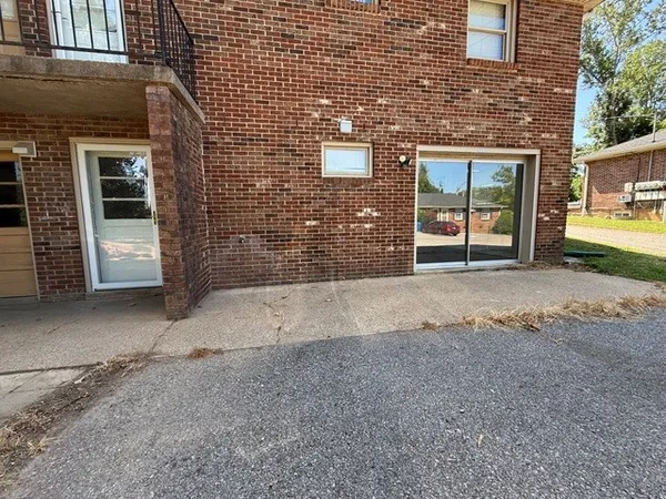 a view of a house with a street