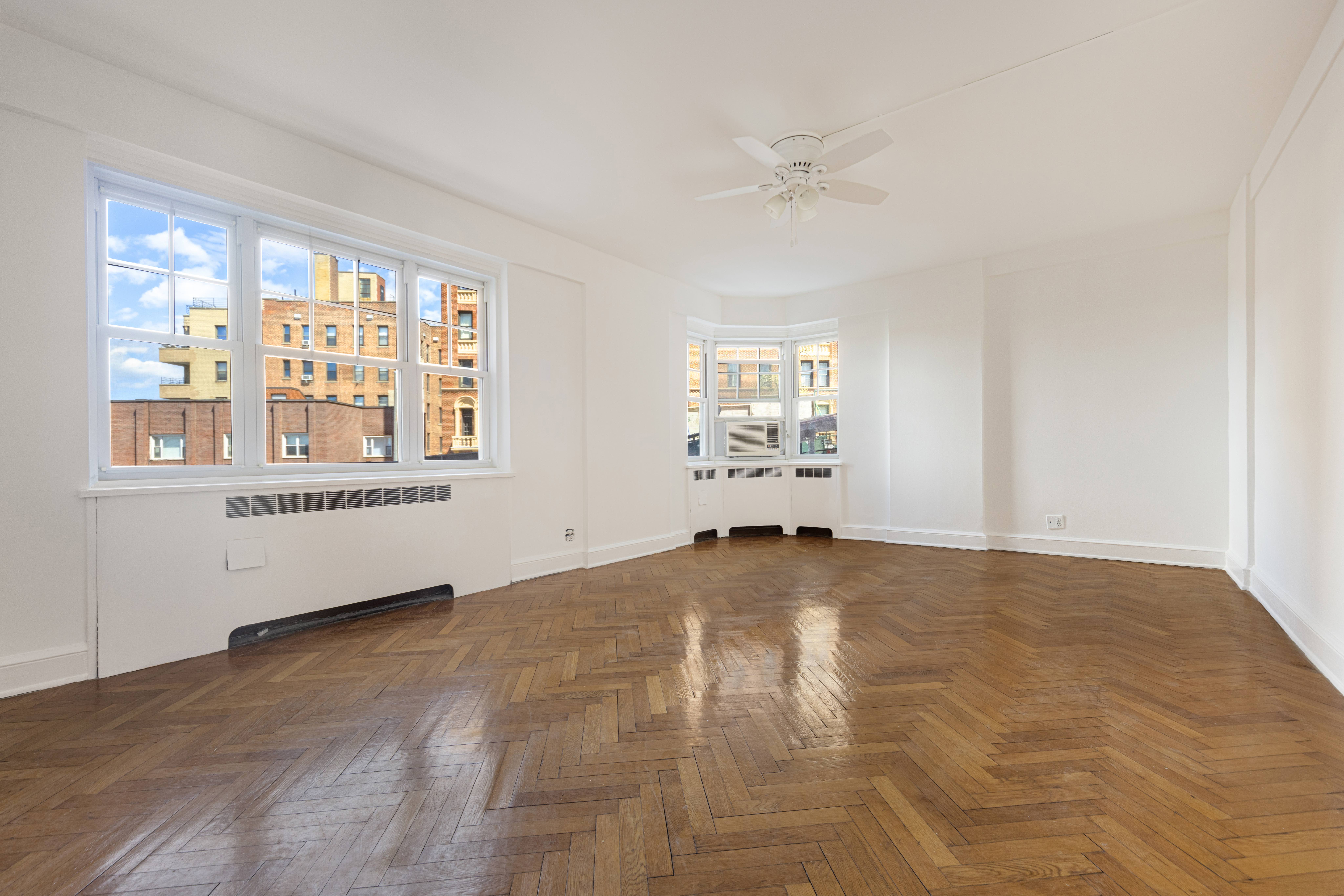 200 Cabrini Boulevard, Unit 17 Manhattan, NY 10033 - Photo 2 of 24 a view of an empty room with a window