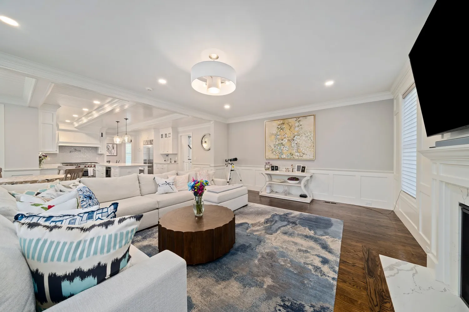 a bedroom with furniture and a chandelier