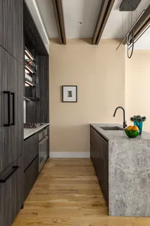a bathroom with a sink and mirror
