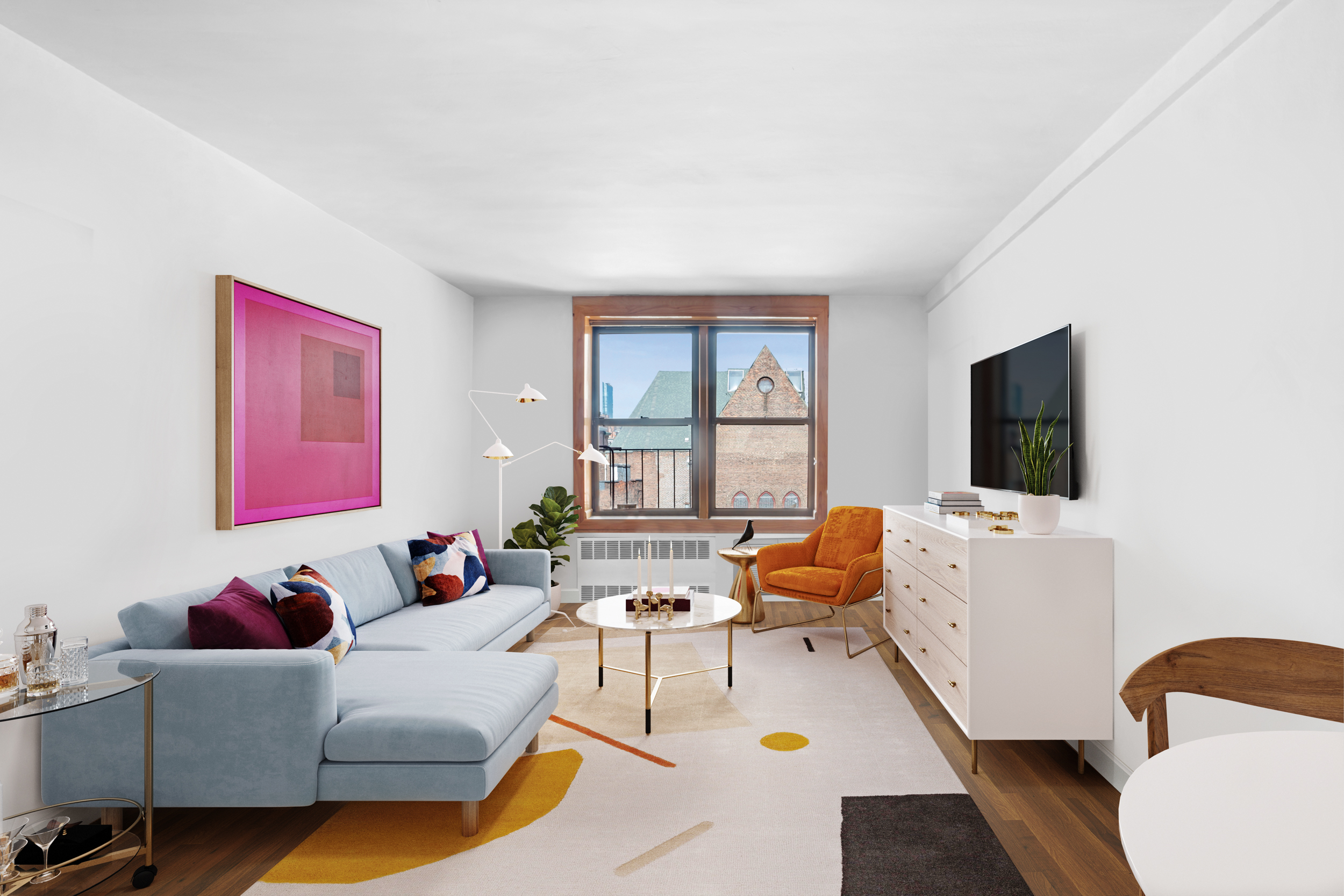 a living room with furniture and a flat screen tv