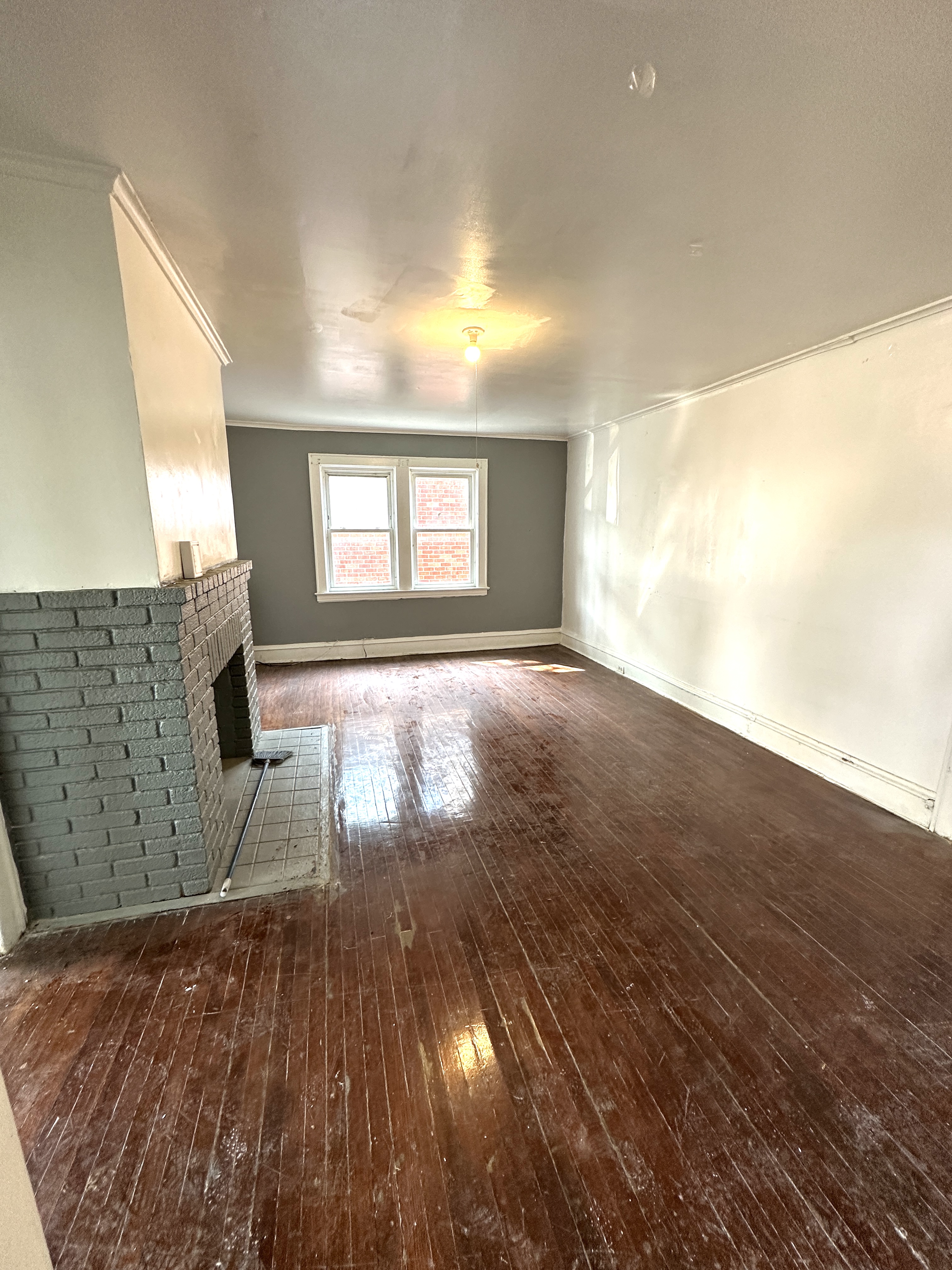92-64 Springfield Boulevard Queens, NY 11428 - Photo 4 of 25 a view of an empty room and window