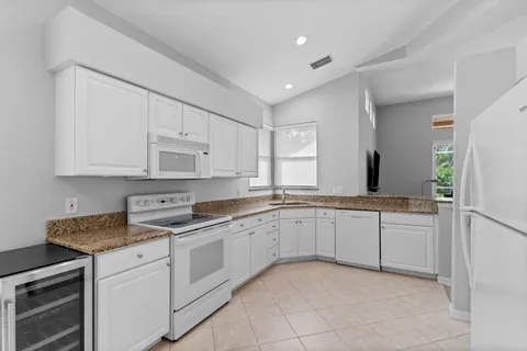$995,000 | 1717 Winding Oaks Way, Naples, FL 34109