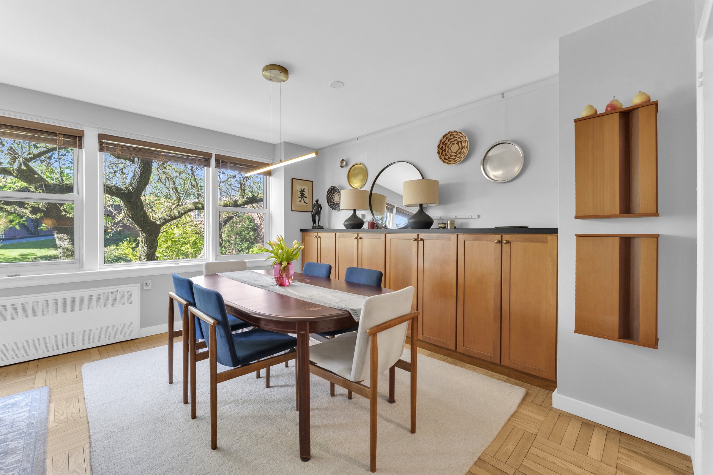 4555 Henry Hudson Parkway West, Unit A310 Bronx, NY 10471 - Photo 4 of 16 a view of a dining room with furniture window and wooden floor